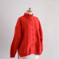 Wool hand knitted cable cardigan in red