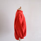 Wool hand knitted cable cardigan in red