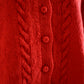 Wool hand knitted cable cardigan in red