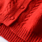 Wool hand knitted cable cardigan in red