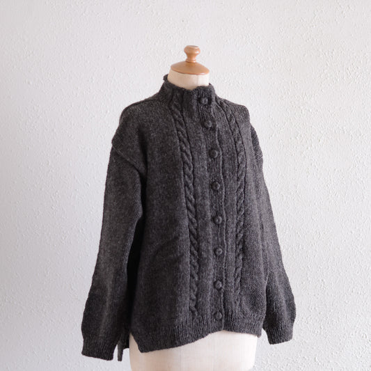 Wool hand knitted cable cardigan in brown