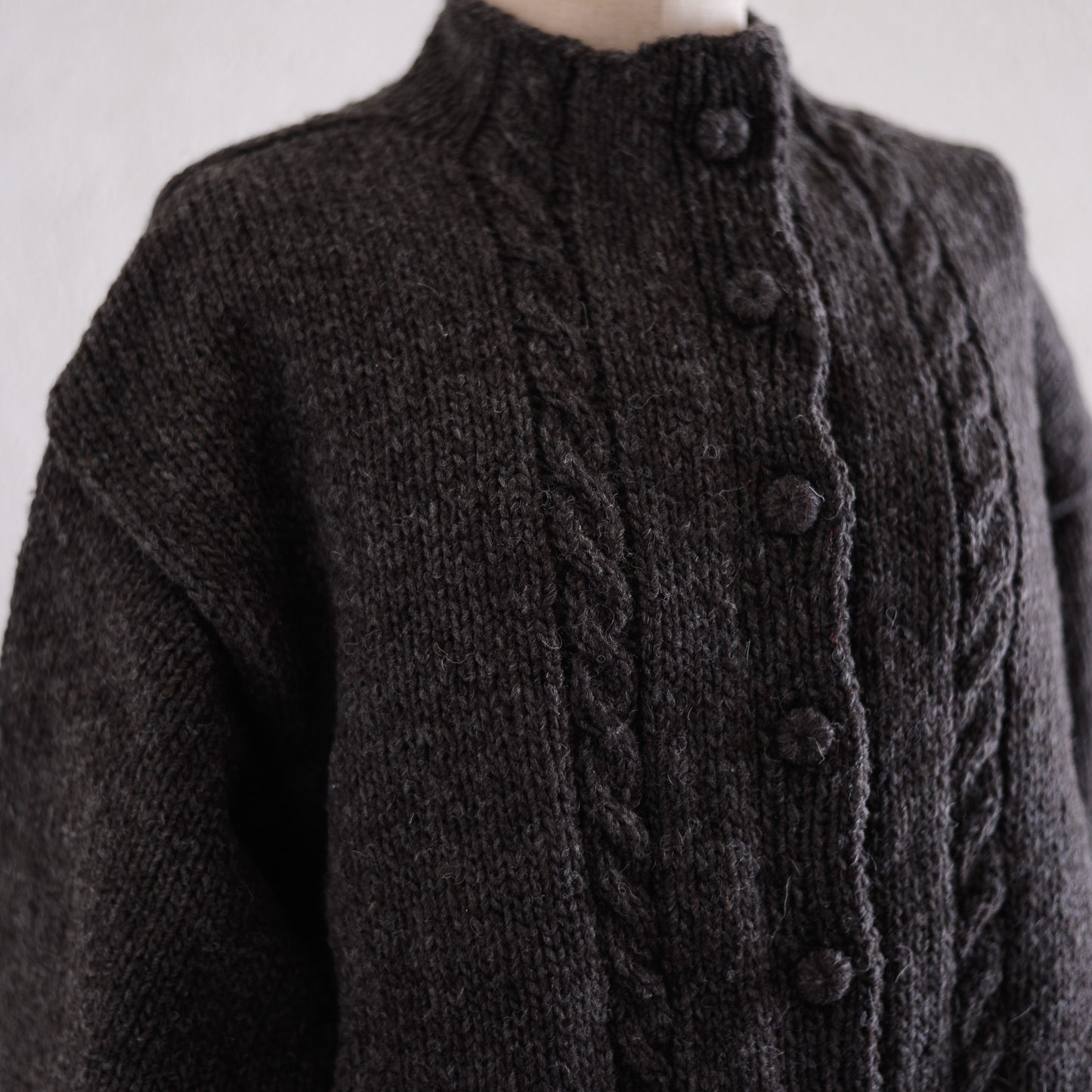 Wool hand knitted cable cardigan in brown