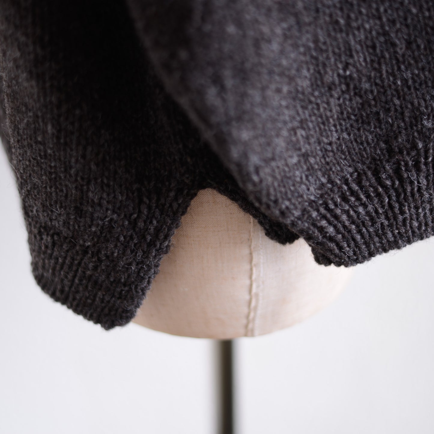 Wool hand knitted cable cardigan in brown