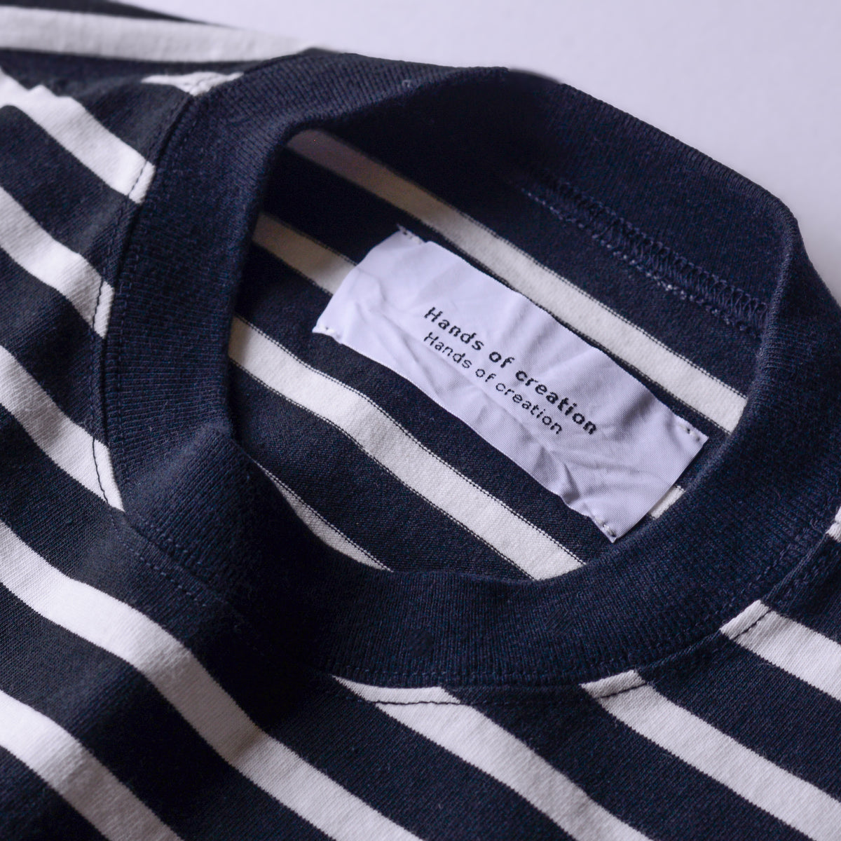コットンボーダクルーネックプルオーバー Black × Off White