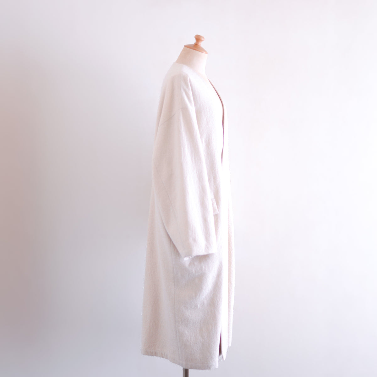 Soft wool collarless coat in Black