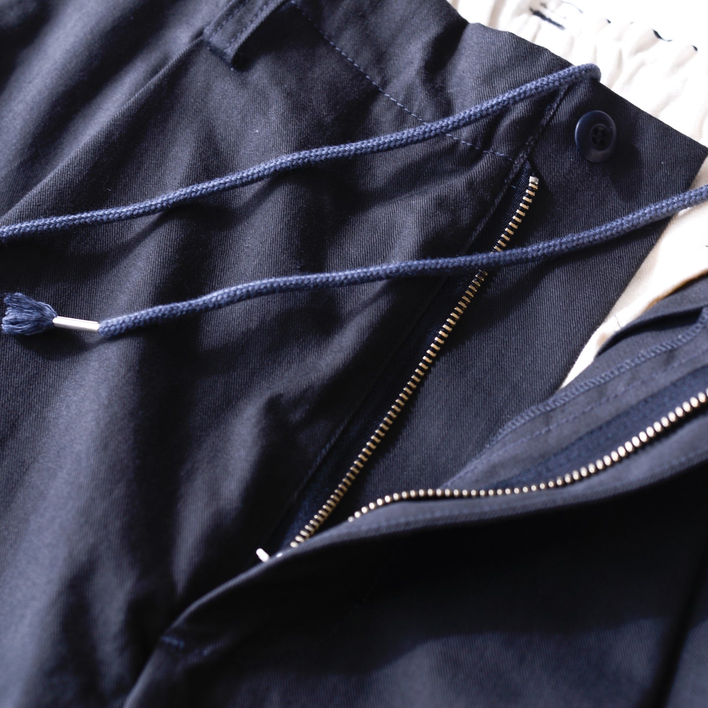 Cotton tapered chino pants in Charcoal Gray