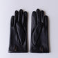 Silk-lined studded leather gloves in Black